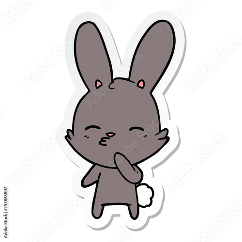 sticker of a curious bunny cartoon