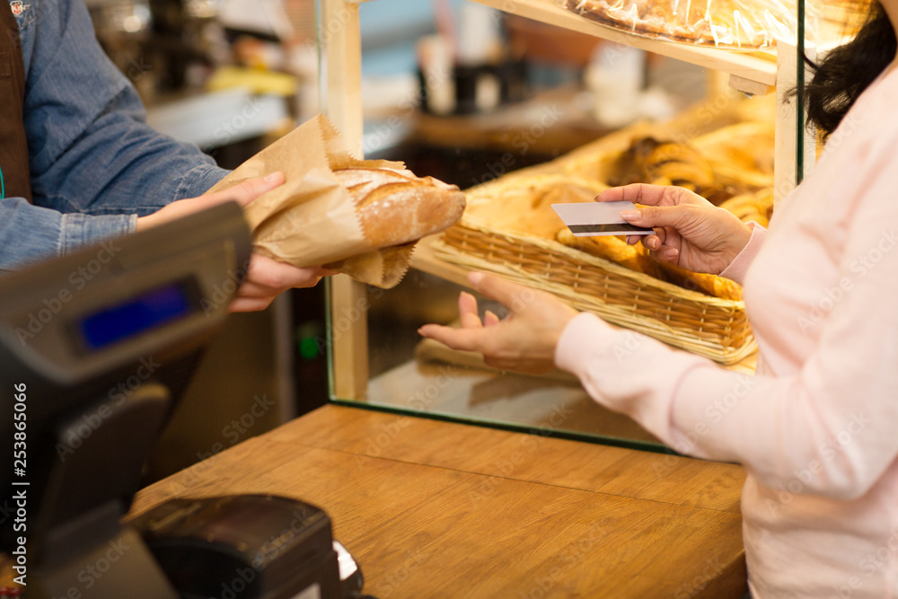 Male baker working at his store