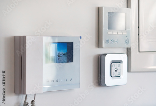 Obraz na płótnie Close up wall with security alarm and video intercom