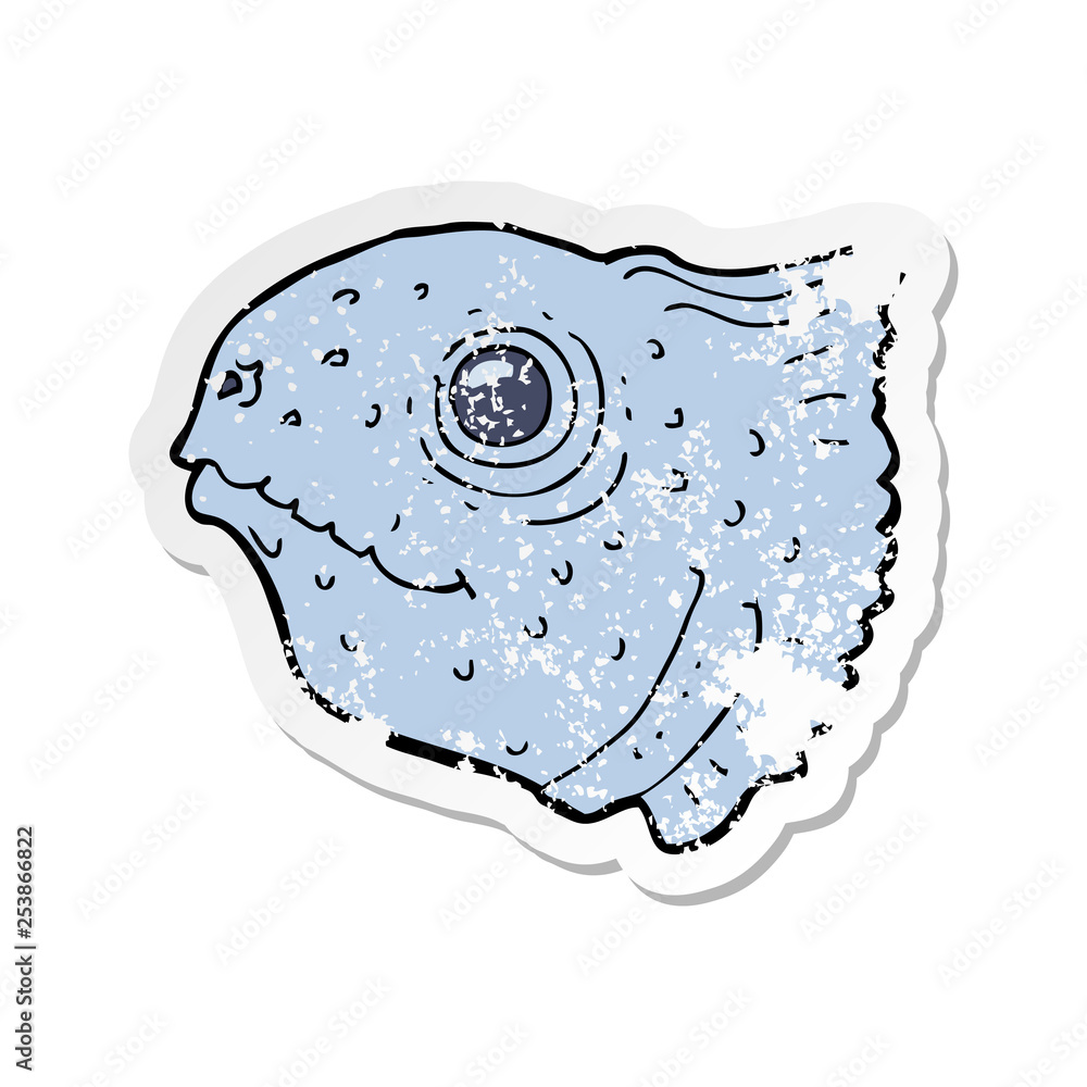 retro distressed sticker of a cartoon fish head