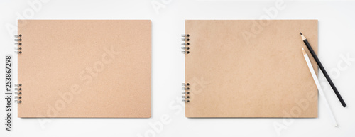kraft notebook and pen on white background