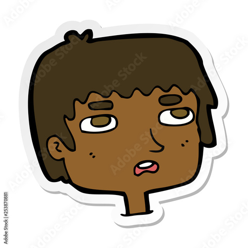 sticker of a cartoon unhappy face
