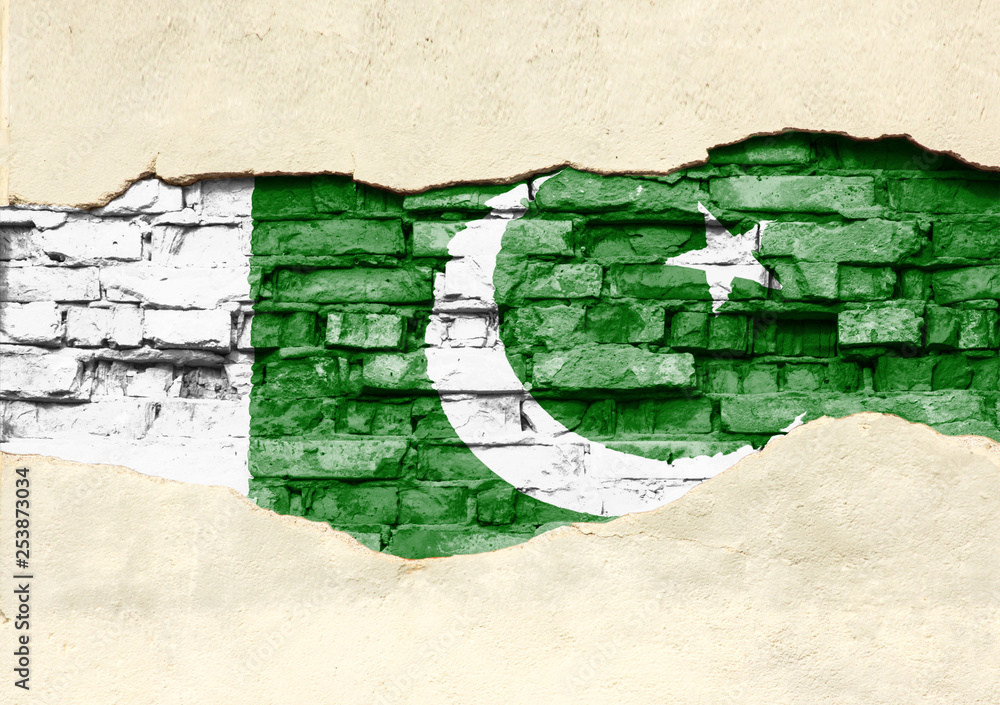 National flag of Pakistan on a brick background. Brick wall with partially destroyed plaster, background or texture. National flag of Pakistan on a brick background. Brick wall with partially destroyed plaster, background or texture.