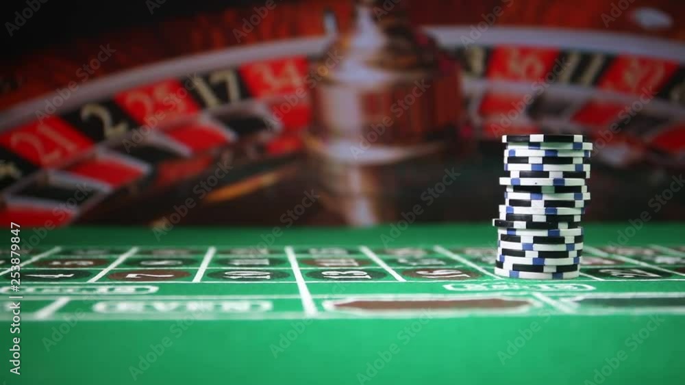 Cards and chips on green felt casino table. Abstract background with copy space. Gambling, poker, casino and cards games theme. Casino elements on green. Selective focus Cards and chips on green felt casino table. Abstract background with copy space. Gambling, poker, casino and cards games theme. Casino elements on green. Selective focus