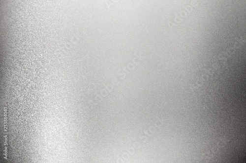 Shiny rough gray metal wall, abstract texture background