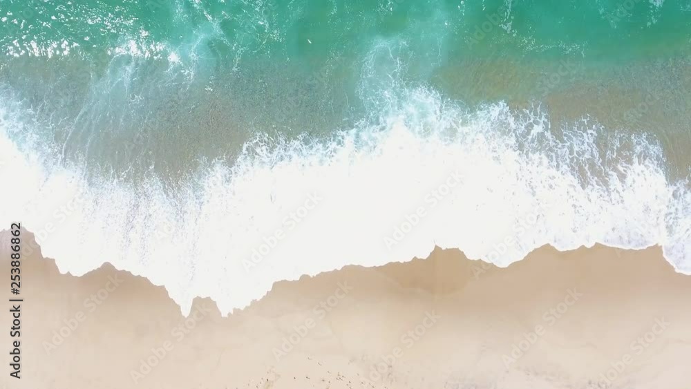 Aerial waves breaking slowly the sand. Aerial waves breaking slowly the sand.