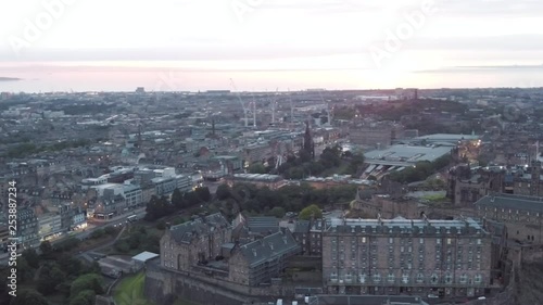 Wallpaper Mural Aerial drone shot of an Old and historic fortress which dominates the Skyline of Edinburgh in Scotland from its position on the Castle Rock called the Edinburgh Castle with a beautiful sunrise Torontodigital.ca