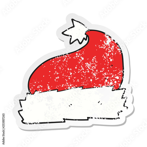 retro distressed sticker of a cartoon christmas hat