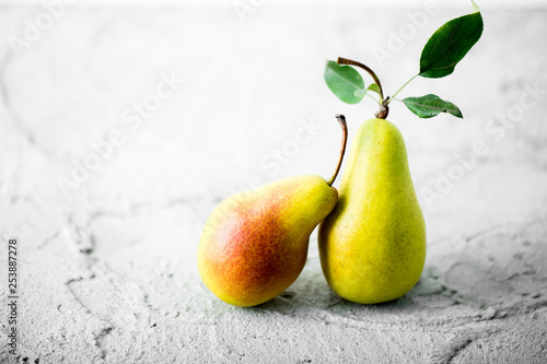 Pears on a concrete background