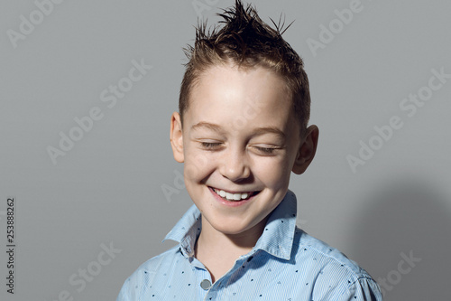 Portrait of a funny boy laughing