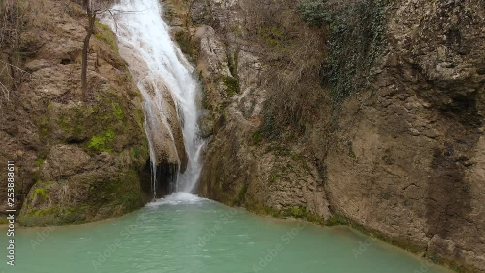 Drone shot of small waterfall Drone shot of small waterfall