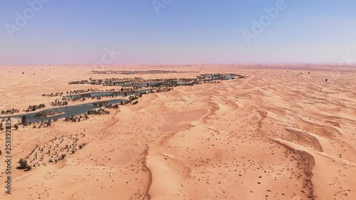 Aerial shot of the manmade lakes of Al Qudra Dubai UAE Desert Oasis photo