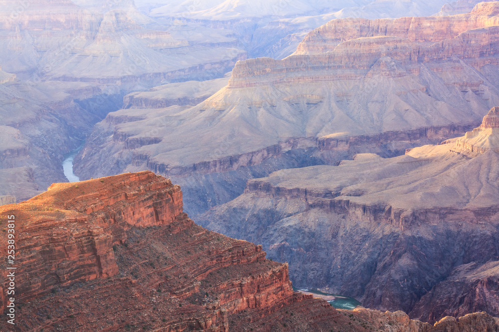 grand canyon in hazy light at sunset
