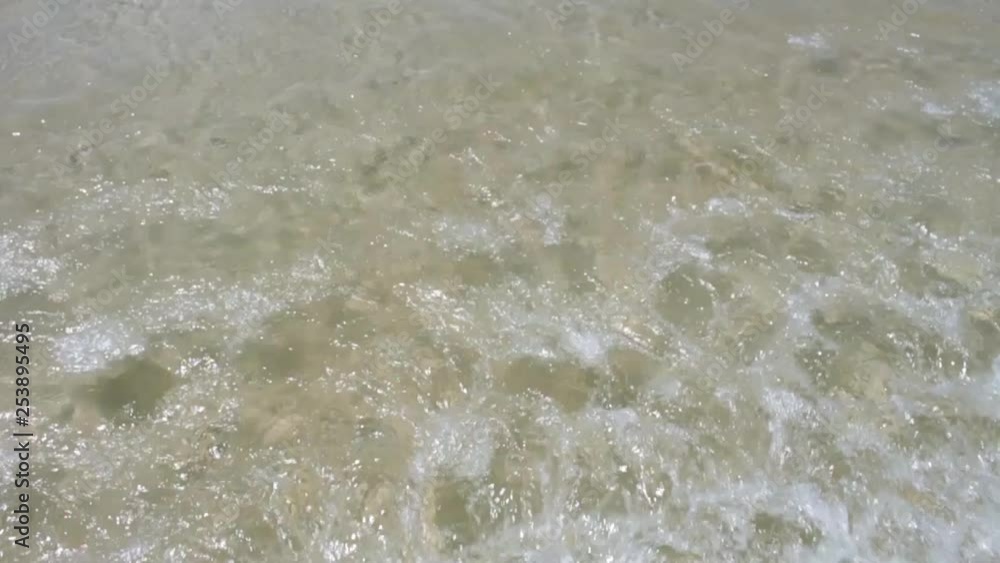 Calm tide in slow motion. Waves on the beach. Floripa, Brazil Calm tide in slow motion. Waves on the beach. Floripa, Brazil