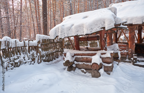 Wallpaper Mural Old traditional wooden country well well made of logs Torontodigital.ca