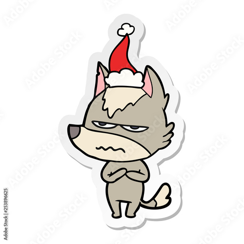 sticker cartoon of a annoyed wolf wearing santa hat