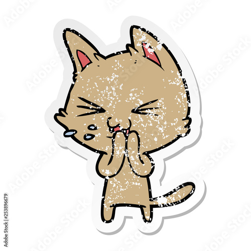 distressed sticker of a cartoon cat hissing