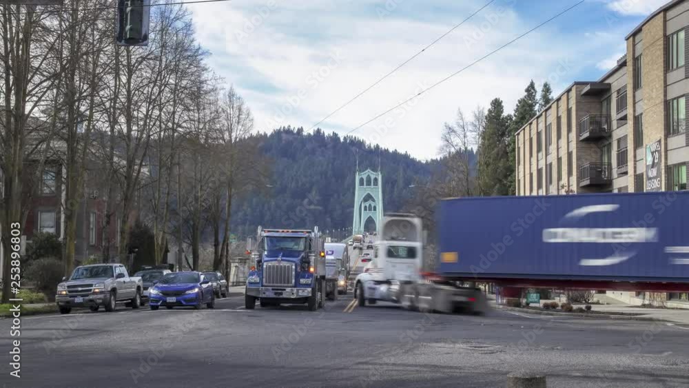 Time Lapse movie of cars, trucks and people going over St. Johns bridge in Portland, Oregon. Time Lapse movie of cars, trucks and people going over St. Johns bridge in Portland, Oregon.