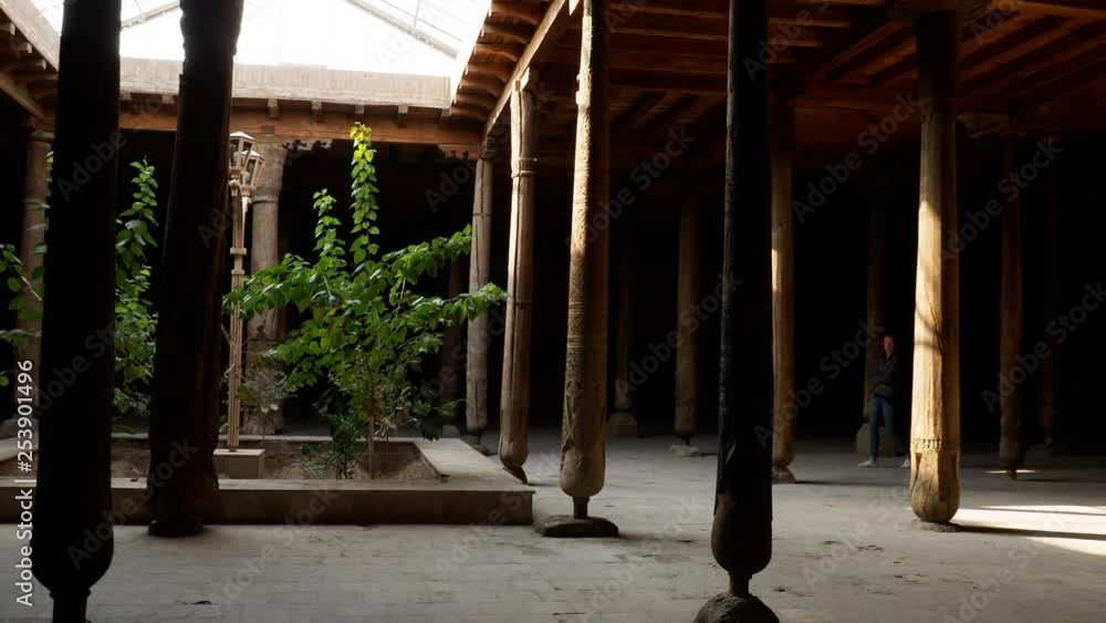 Walking through rustic temple in the city of Khiva Walking through rustic temple in the city of Khiva