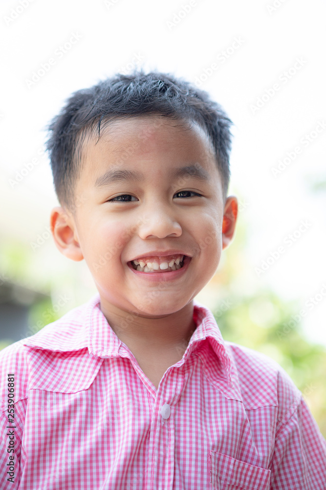 close up headshot of cheerful asian children toothy smiling face of happiness emotion close up headshot of cheerful asian children toothy smiling face of happiness emotion