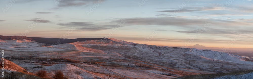 Panorama of winter mountains in Caucasus region