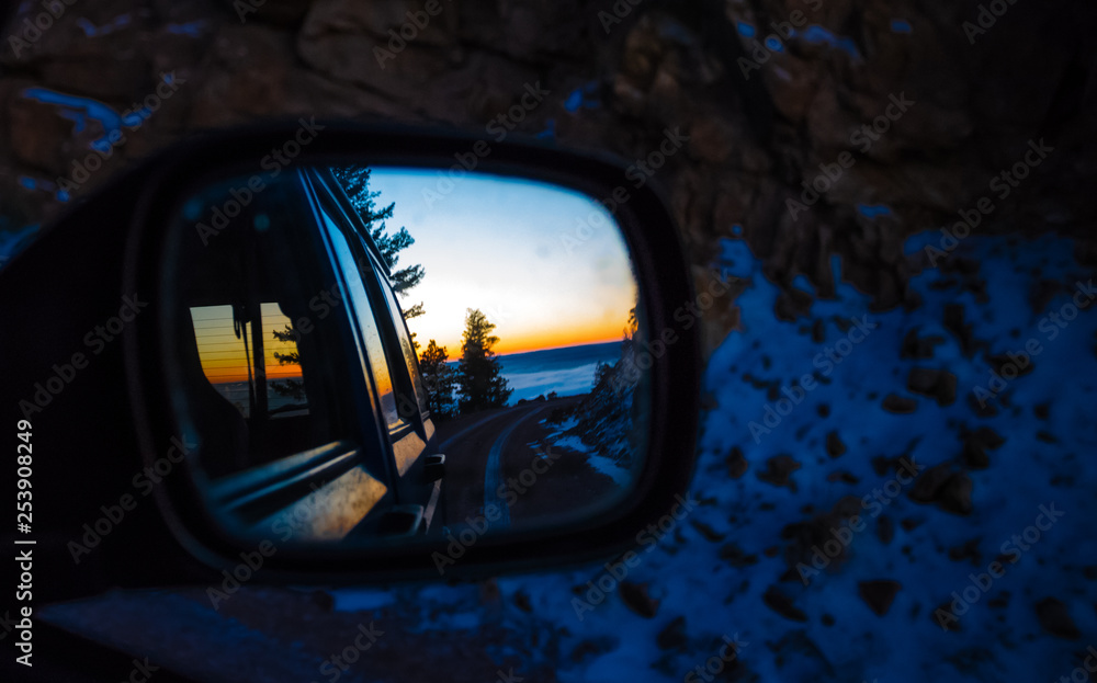 Mirror view of sunrise on a mountain