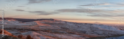 Panorama of winter mountains in Caucasus region