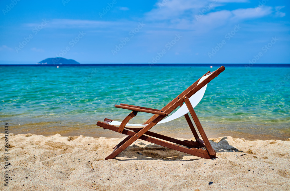 Beautiful beach with lounger chair