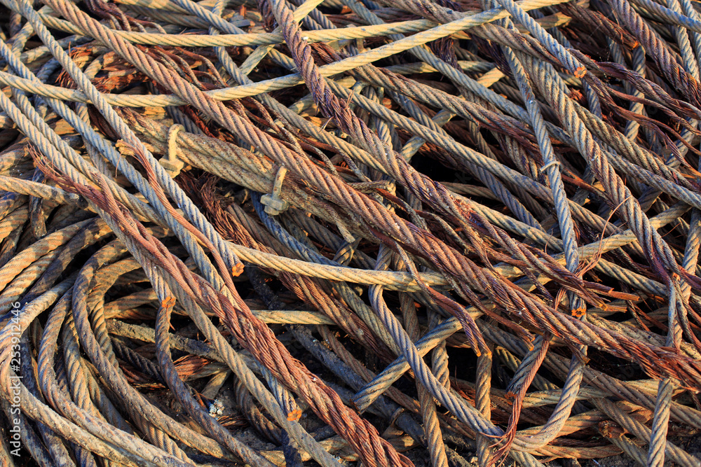 Rusted steel wire scrap.Wire rope - heavy duty steel wire cable Rusted steel wire scrap.Wire rope - heavy duty steel wire cable