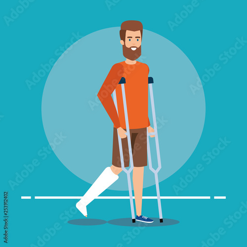 disabled man walking with crutches for leg fracture