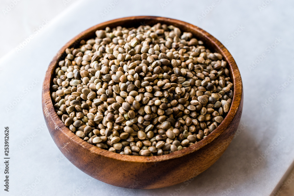 Organic Roasted Hemp Seeds in Wooden Bowl. Organic Roasted Hemp Seeds in Wooden Bowl.