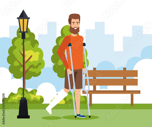 man walking with crutches and leg fracture