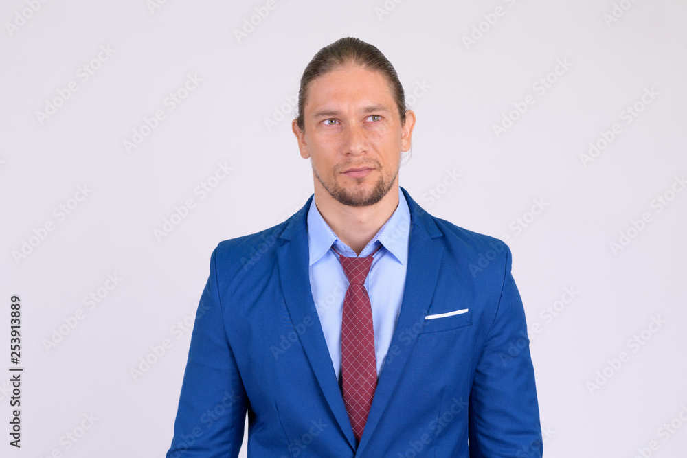 Portrait of handsome businessman in suit thinking Portrait of handsome businessman in suit thinking