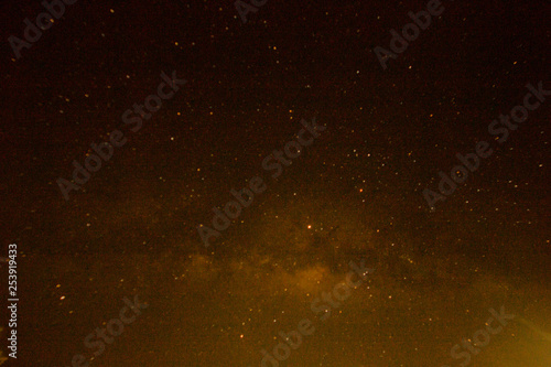 abstract background with stars and milky way in nebula.