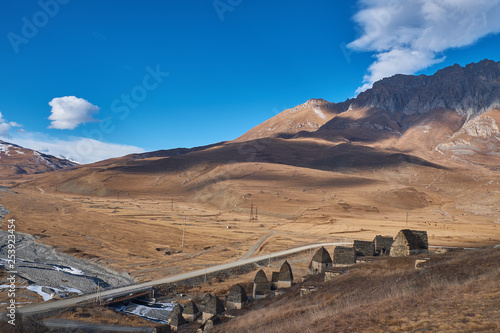 City of the dead. Necropolis outside the village of Dargavs  photo