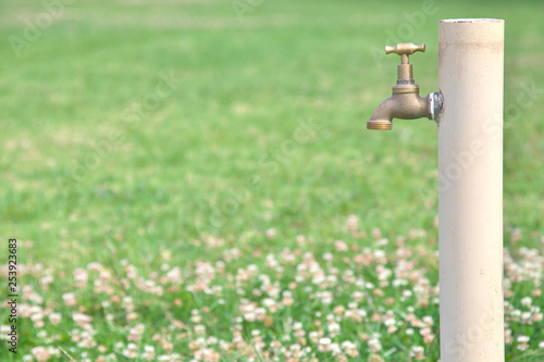 outdoor garden water faucet or tap photo