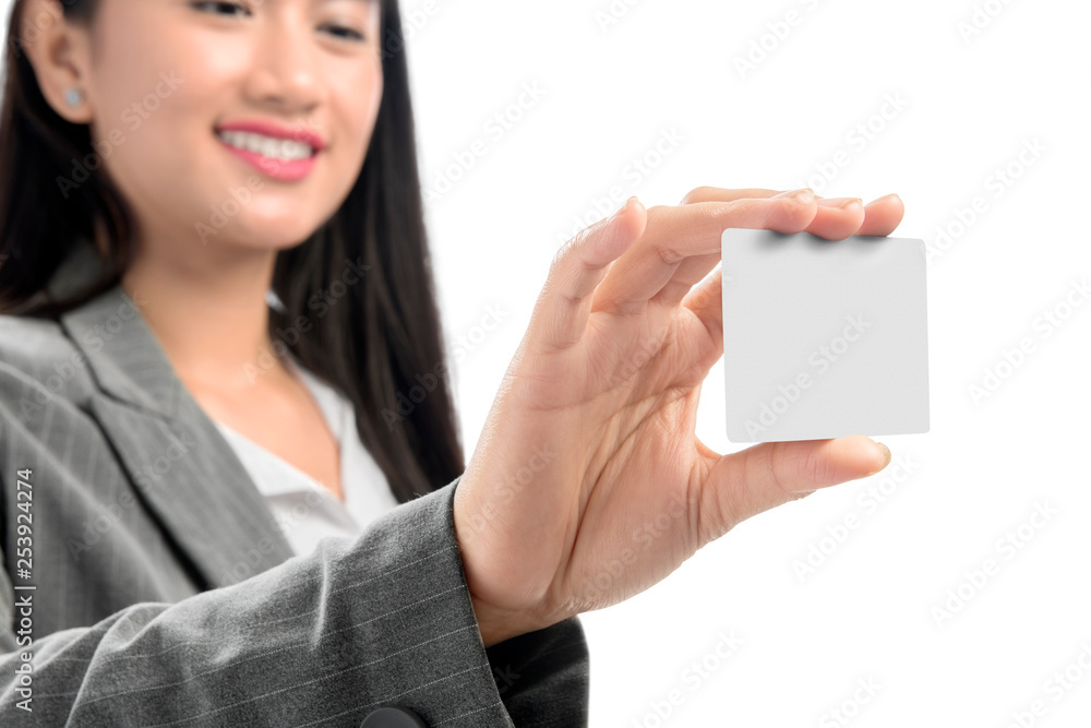 Pretty asian business woman showing blank business card on her hand standing Pretty asian business woman showing blank business card on her hand standing