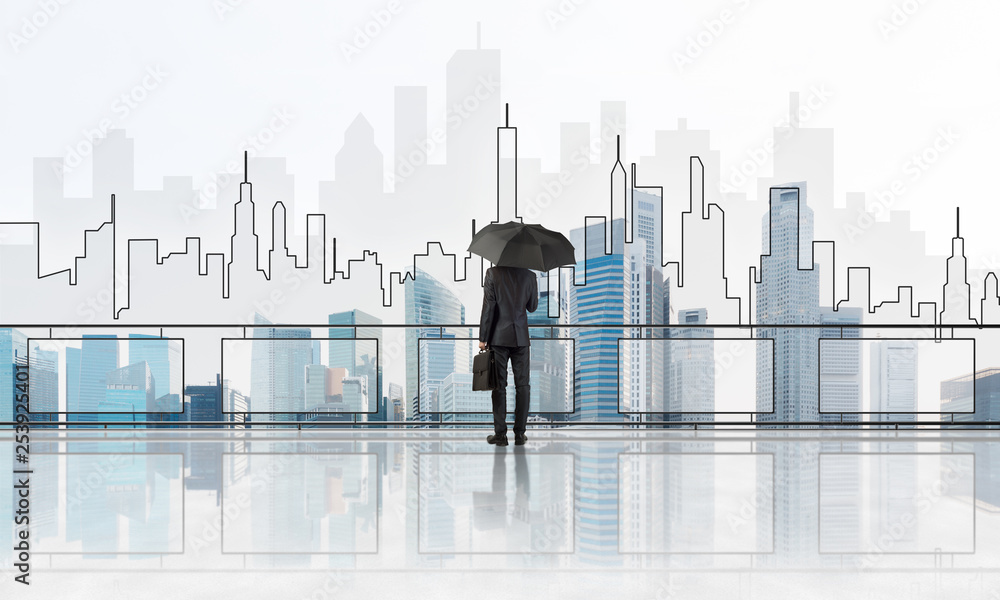 Elegant businessman standing with back and looking at modern business cityscape. Mixed media Elegant businessman standing with back and looking at modern business cityscape. Mixed media