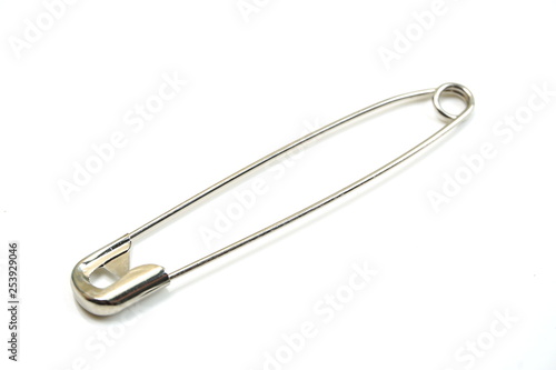 metal safety pins isolated on white background