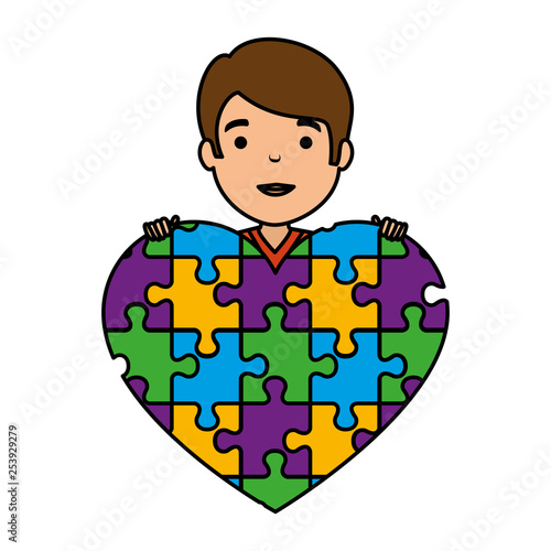 young boy with heart puzzle attached