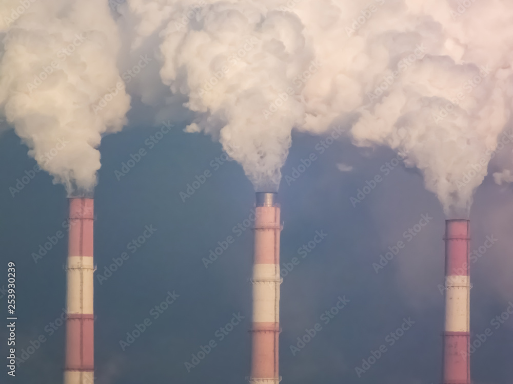 Pipes smoke, carry out harmful emissions. Global warming. Carbon dioxide emissions