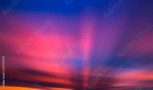 sunrise rays through the clouds  motion blur