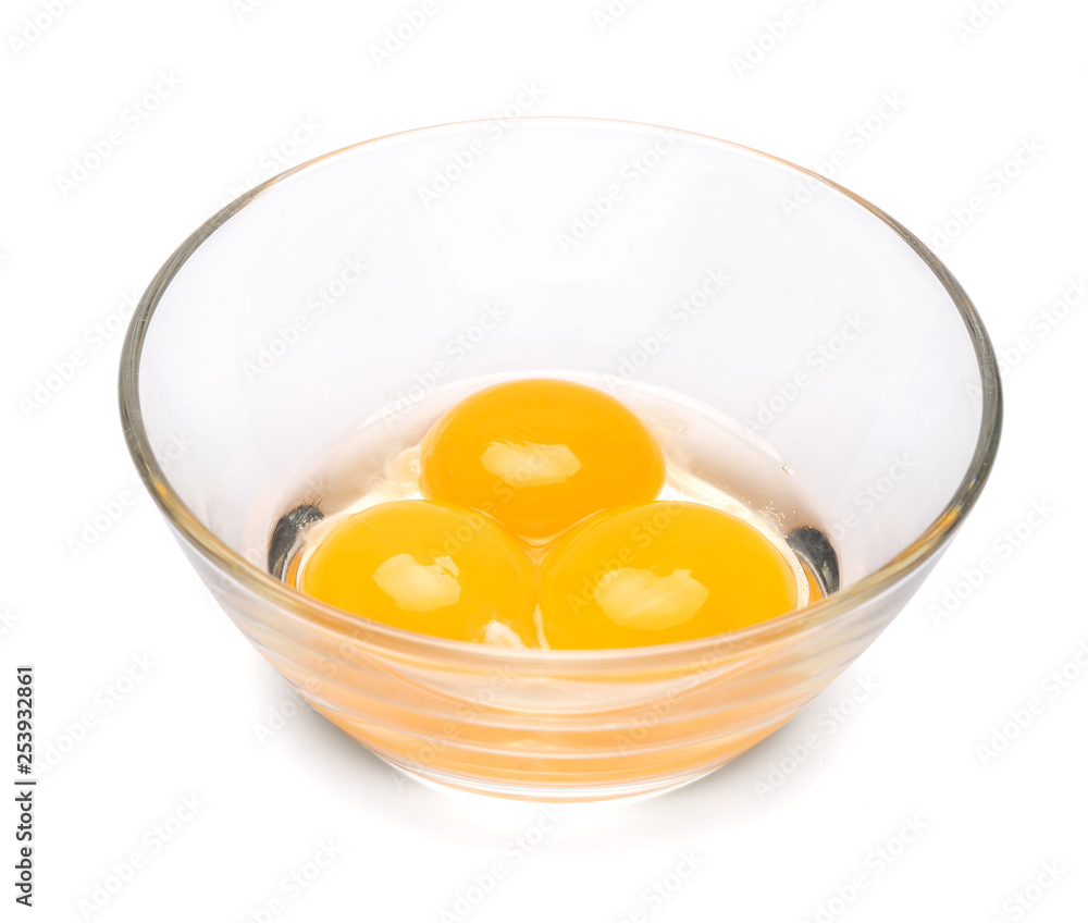 three egg yolk in a glass bowl isolated on white background with clipping path three egg yolk in a glass bowl isolated on white background with clipping path