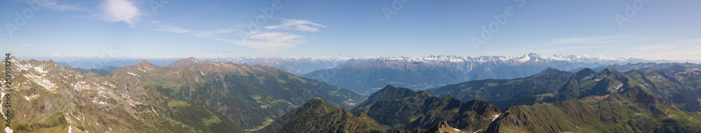 Drone aerial view of the Alps during spring season. Italian Alps. Italy Drone aerial view of the Alps during spring season. Italian Alps. Italy