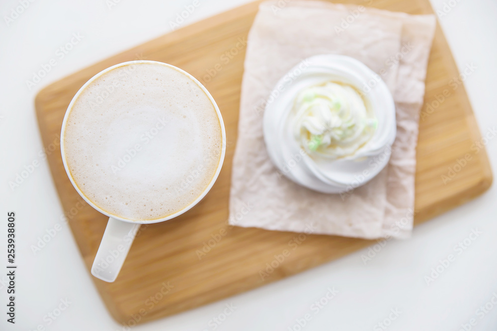 Low-calorie dessert Pavlova with a cup of coffee Low-calorie dessert Pavlova with a cup of coffee