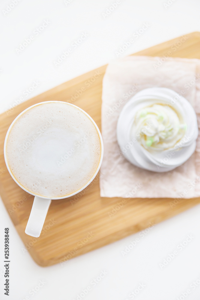 Low-calorie dessert Pavlova with a cup of coffee Low-calorie dessert Pavlova with a cup of coffee