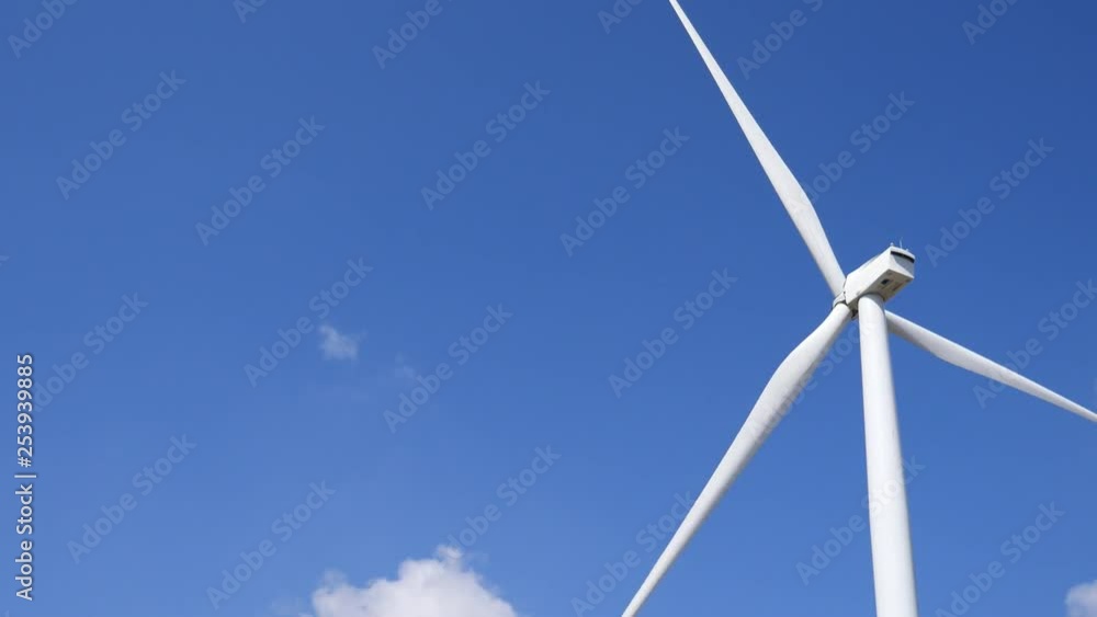 wind turbine against blue sky wind turbine against blue sky