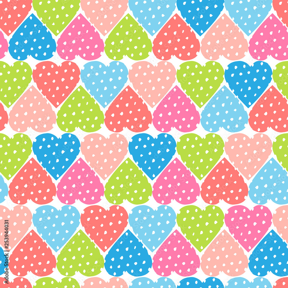 Colorful vector seamless pattern with polka dot hearts in cute spring colors on white background. Pink, green and blue shapes. Fun wallpaper design for fabric and textile.