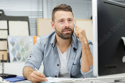 Принти на полотні craftsman using the phone