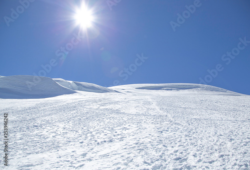 Winter mountain landscape with mountains and blue sky © Vasyl